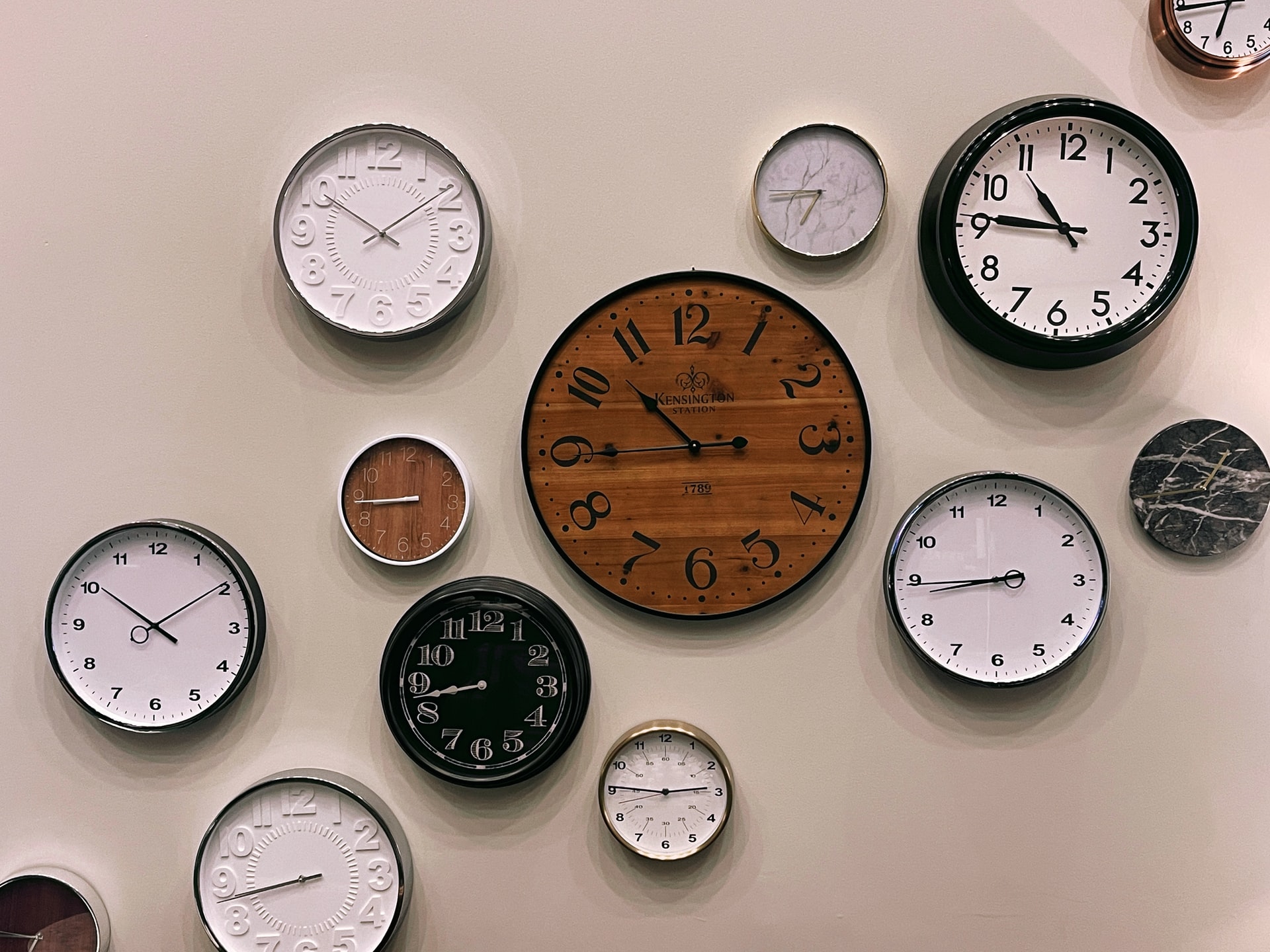multiple clocks on the wall